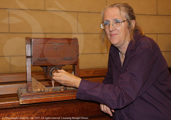 Veronica Antcliff showing how the juror box from the original Scone courthouse works.