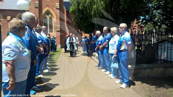 LOCAL bowlers form a guard of honour for Earl Dalley.
