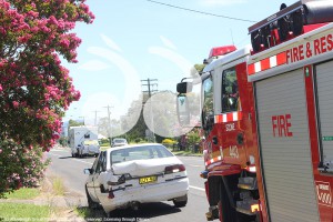 The sedan was involved in a rear end collision with a van and was unable to be driven off the Highway.