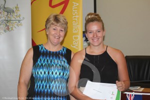 Cr Lee Watts presenting Nikki Hollingsworth from St Joseph's high School with a School Award at the Australia Day celebrations in Scone