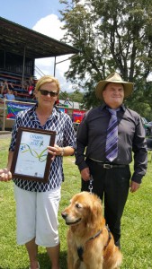 Murrurundi Citzen of the Year Debbie Eather with Australia Day Ambassador Nick Gleason and guide dog Unity.