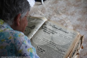 Betty Pinkerton reading through old newspapers to unearth more local history