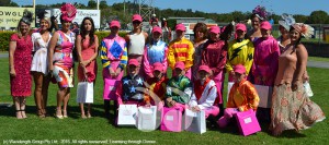 The female jockeys in the all female race, with ladies of the Pink Skilks commitee.