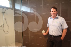 Matthew Downie, chief executive officer of Strathearn showing the bathroom designed with the carers of residents in mind