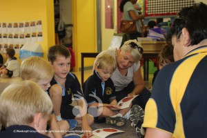 St Marys Kindergarten reading as part of atholic Schools week. L-R: Kaden, Cooper Rumsby, Billy Robinson, Fergus Carrigan, Seamus Hartmann, Justine Hartmann, Matthew, Patty Dunn.