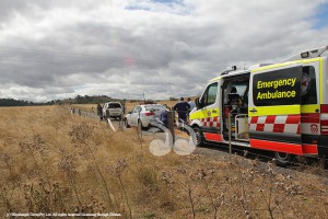 Ambulance treating an apprehended male at the scene on the outskirts of Scone.