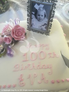 The birthday cake for Eva with picture of her as a child.