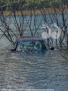 A blue Honda CRV dumped in the Dam causing another headache for the Simpson family.