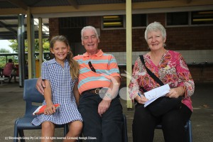 Year 6 student Ella Gordon is all smiles with granny and grandad Catherine and Denis Gordon who travelled from Blaxland in the Blue Mountains for the occasion.