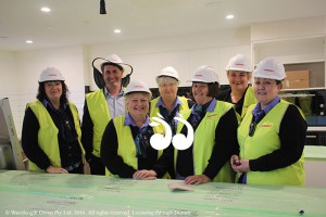 Staff standing in the a new kitchen: Siobhon Leonard, Matthew Downie, Susan Swanson, Gayle Ashford, Janelle Birch, Michelle Jack and Susan East.