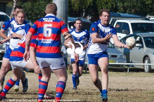 Isaac Austin looking to offload the ball.