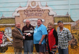 Charles Cook president of the Aberdeen Highland Games, Paul Hobbs secretary of the Aberdeen Men's Shed, Phil Russell president of the Shed, Elizabeth Birch secretary of the Games and Hock Low member of the Shed.