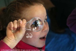 Elsie Kennedy trying out her special ranger magnifying glass.