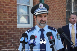 Inspector Guy Guiana speaking to media outside the Scone police station today, with Detective Sergeant Ian Wright in the background.