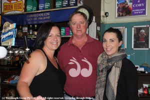 Melanie Bright, Don Adams and Ellee Brown getting ready for the "Dodge" fundraiser at the Golden Fleece Hotel.