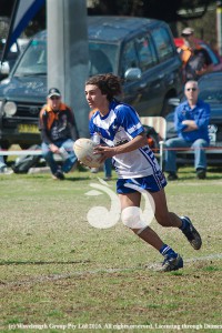 Mitchell Rando running the ball for the Thoroughbreds in the 18's game against Muswellbrook.