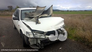 Melanie Bright's car after losing control in a diesel spill and colliding with the guard rail.