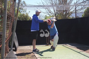 Irish international cricketer Andrew Balbirnie giving advice to Nick Brooks at the Bill Rose Complex.