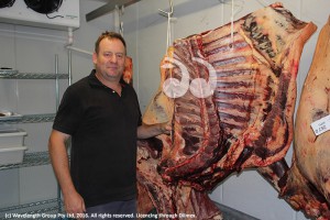 Mathew Grace in the coolroom where some of their beef hangs, soon to be filled with pork products.