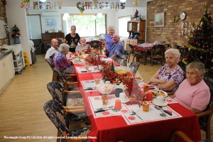 A traditional christmas lunch for the residents at Strathearn Village. From left around the table: Gloria Smith with son George, staff member Julie Brennan, Rodney Lewis, staff member Colleen Wilton, Brian mountain, Joyce Cummins and Irene Manning.