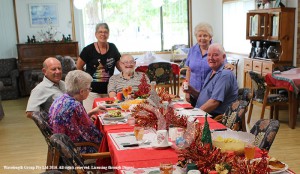 Enjoying a traditional christmas lunch. L-R. George Smith with his mother Gloria, Julie Brennan, Rodney Lewis, Colleen Wilton and Brian Mountain.