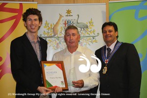 Scone and District Achiever of the Year: Ambassador Dr Benajmin Veness presenting the award to Gregory "Reg" Riley, with Mayor Wayne Bedggood.