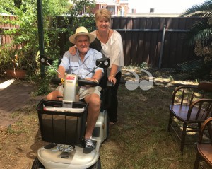 Scone Neighbourhood Centre manager Lee Watts with Lleyton Googe after his scooter was repaired.