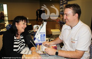 Dianne Pittard having her blood pressure taken by Ben Butters from Scone Discount Drug Store.