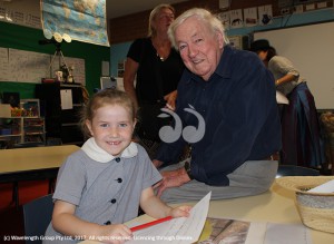 Ruby Ryan with her poppy Doug Cullen during grandparents day at Scone Grammar School.