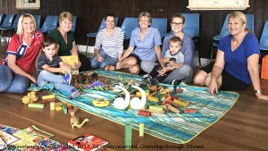 Toybox Talk in Wingen: Jen Deakin from Toybox, Ted Murphy enjoying the toy time, Lee Watts manager of the Neighbourhood Centre, Tiffany Willis and Amanda Catzikiris Community Workers, Natalie and Lachlan Reeve and Barb Long.