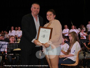 Wade Crockett General Manager of Upper hunter Shire Council presents holly Almond with the award for designing the logo for the camp this year.