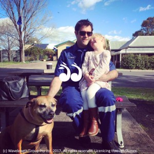 Mitchell Beaman with his dog Narla and his little girl Evie.