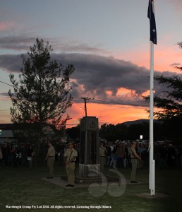 The colour party under the dawn sky at the Scone ANZAC Memorial Service.