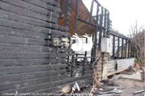 The southern side of the house, showing the window of the bedroom where the fire is believed to have been ignited.