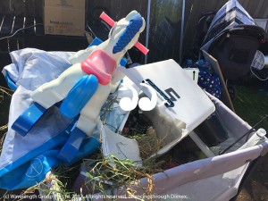 Rubbish such as grass clippings are being dumped at charity bins.