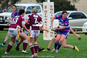 Loren Heath looking to offload the ball.