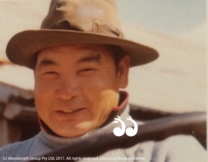 Lee Fong in his younger years behind the tractor.
