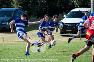 Hayden Bell putting boot to ball in his first game for 2017