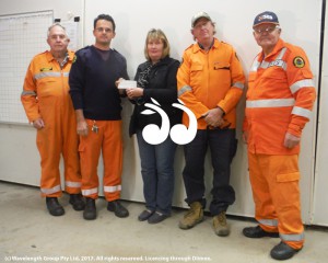 Elizabeth Birch from the Aberdeen Highland Games handing over the cheque to the Aberdeen SES. L-R: Ray Butchard, Tim McElory, Elizabeth Birch, Bob Kegan and Mick Batten.