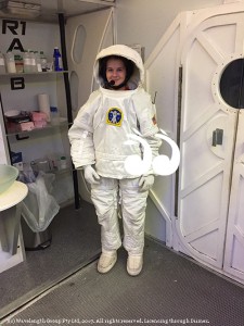 Izzy Roughan in her spacesuit at NASA.