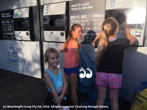 More children recycling: Adele and Iris Flaherty with Amelia Hartmann depositing their cans for pocket money.