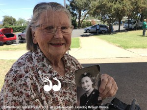 Betty Widdrington Hickey (nee Lee) came back to Scone to remember her family's service in WWI and holds a photo of when she was in the army when she was in her 20's.