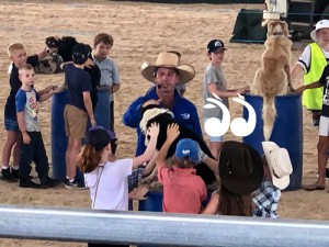 Tom Curtain gathering the kids and dogs for some 'outback epxerience' fun.