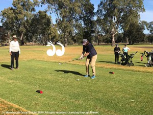 Dordie Bragg (left) giving Kim Clydsdale a few swing tips watched on by Judy Collison and Annie Woods.